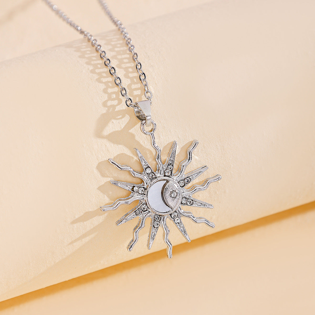 JC-250106NCL-024  Fashion Alloy Moon Pendant Niche Sun